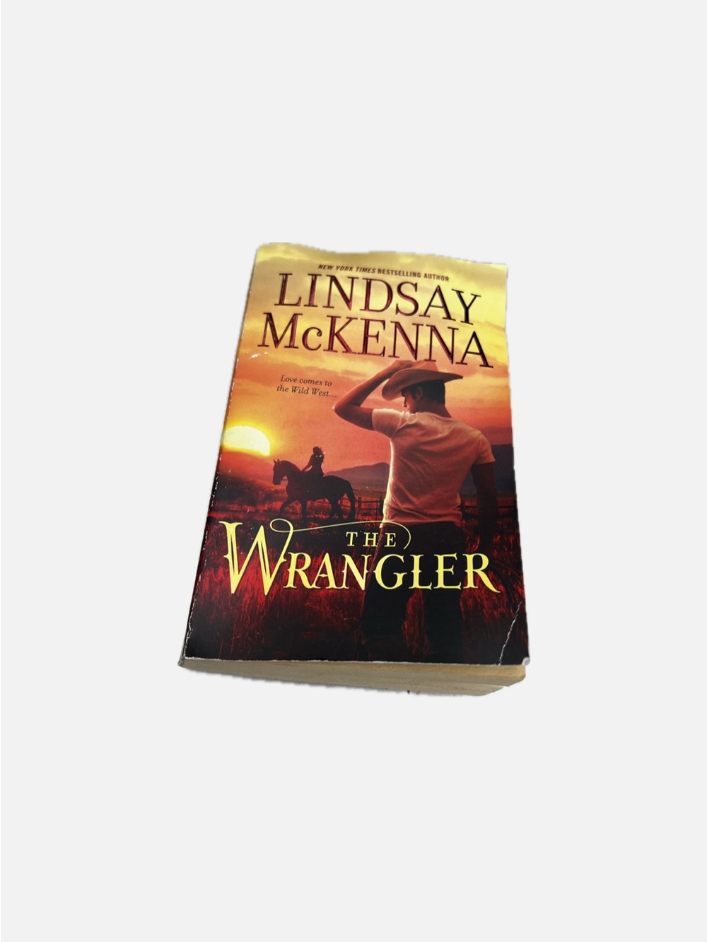 Lindsay McKenna "The Wrangler" Paperback Book - Sunset Orange/Black